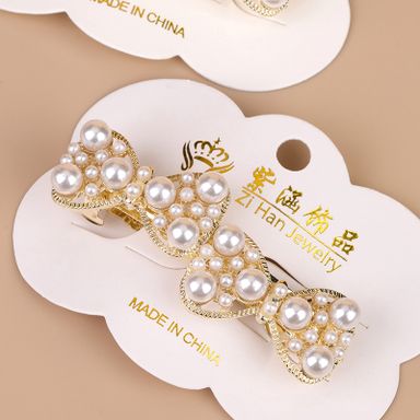 New pearl bow tie horizontal clip