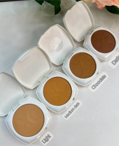 Poudre compacte xclusive