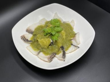 Steamed Toman Fish Slices in Chef's hand-crafted lime, mint sauce | 清蒸薄荷柠檬多曼鱼片
