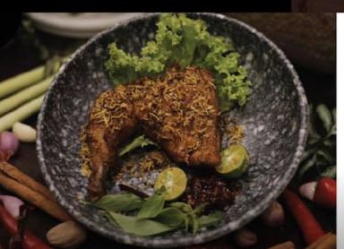 Fried Chicken cooked in special herbs and served with crispy "kremes" topping 