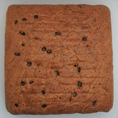Chocolate cake topped with chocolate chips